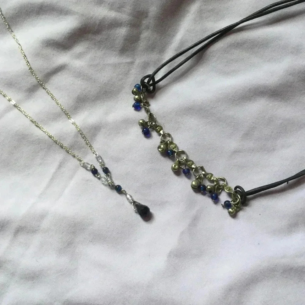 Set of 2 blue necklaces.